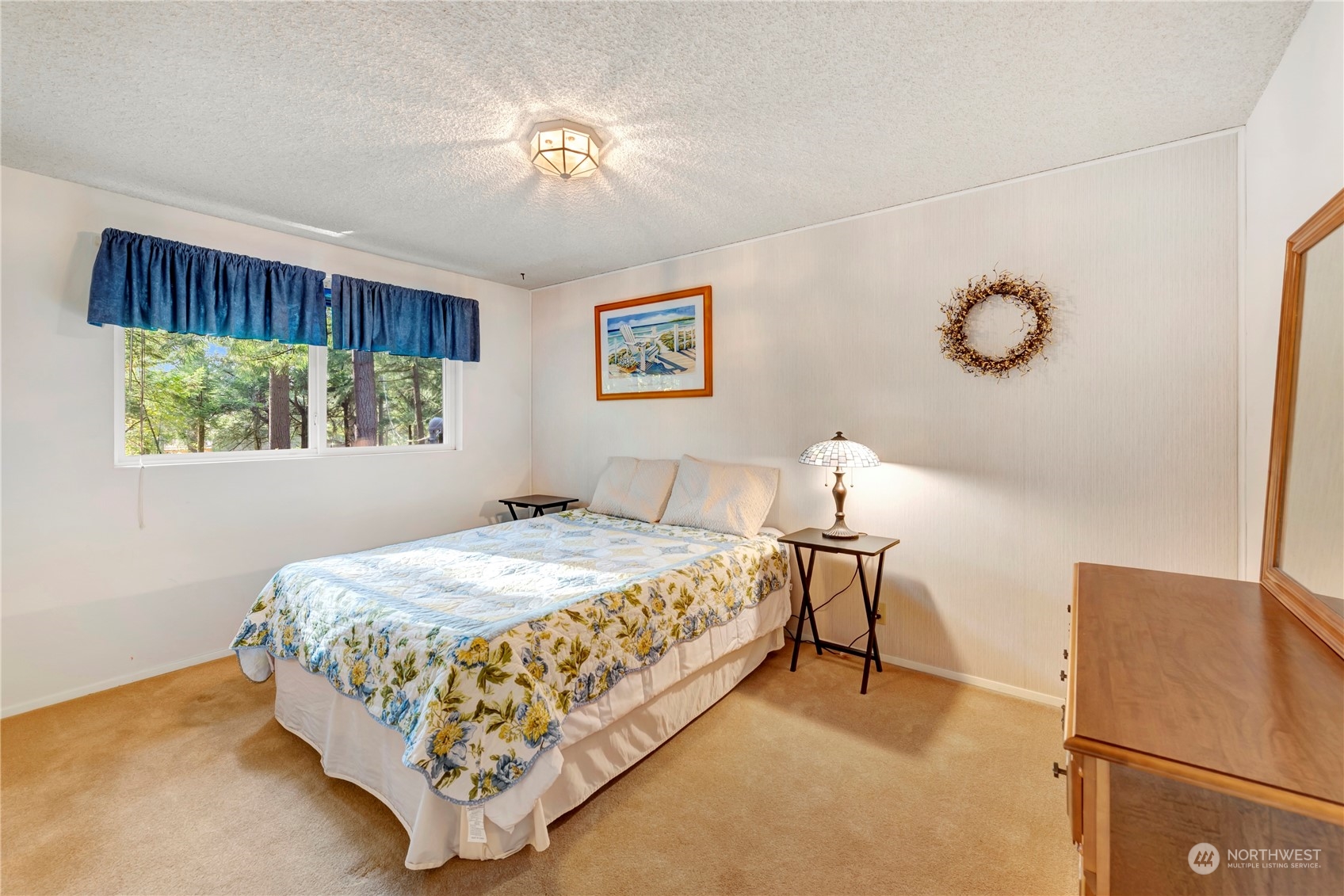 22215 49th Avenue Southeast Bothell, WA 98021 - Photo 17 of 35 a bedroom with a bed and window