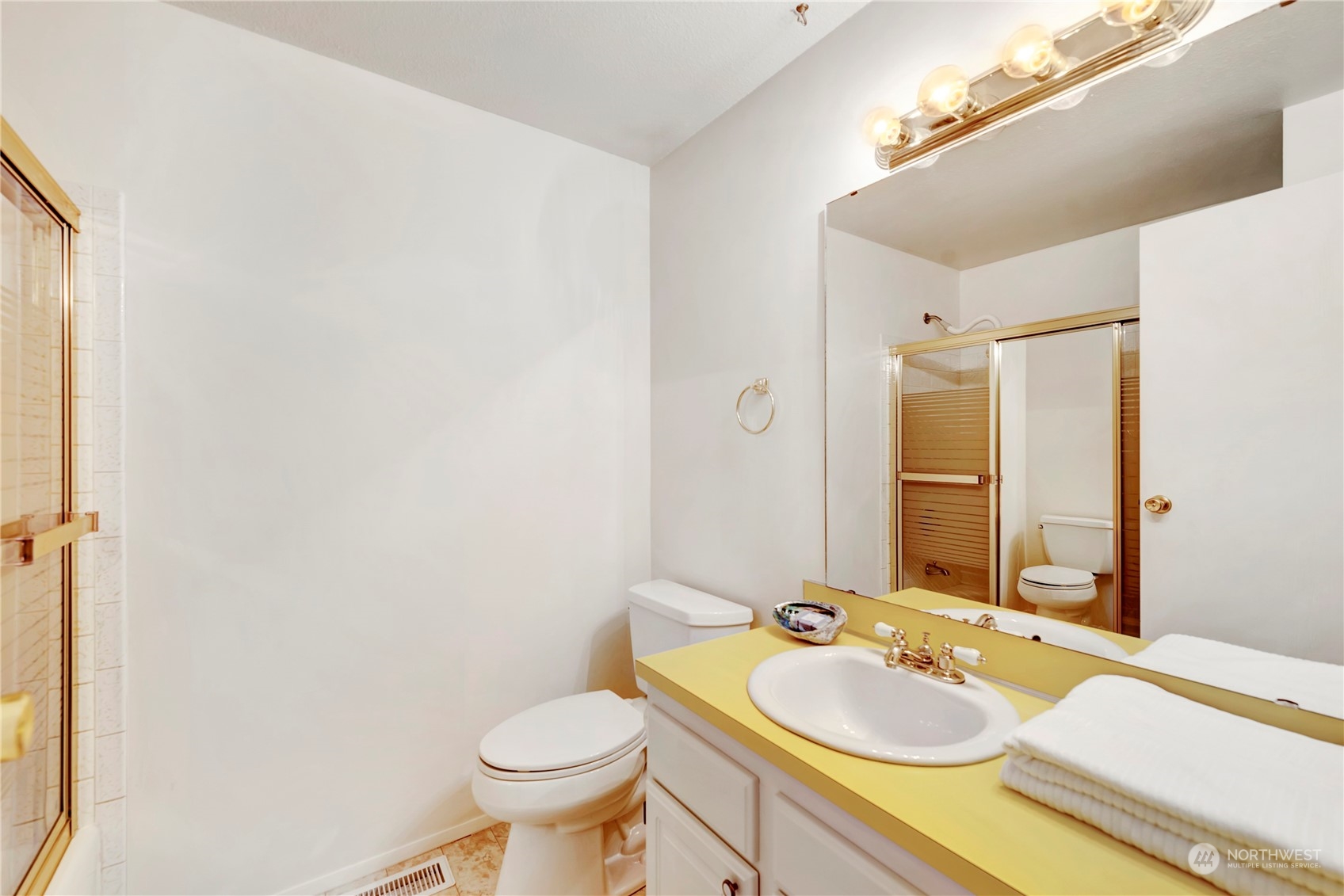 22215 49th Avenue Southeast Bothell, WA 98021 - Photo 19 of 35 a bathroom with a sink and a mirror