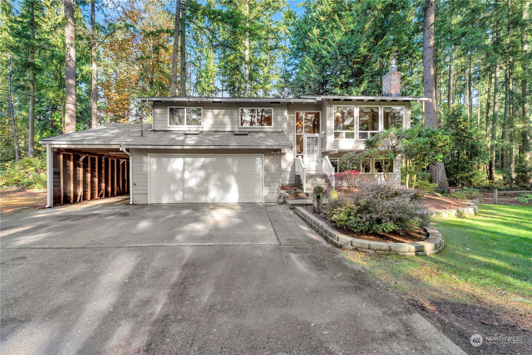 22215 49th Avenue Southeast Bothell, WA 98021 - Photo 2 of 35 a view of a house with backyard and sitting area