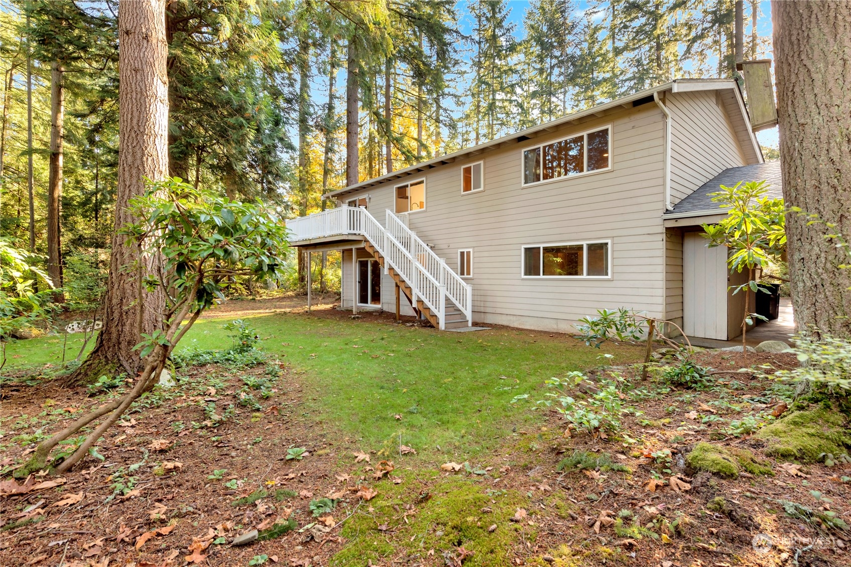 22215 49th Avenue Southeast Bothell, WA 98021 - Photo 30 of 35 a view of a house with a yard