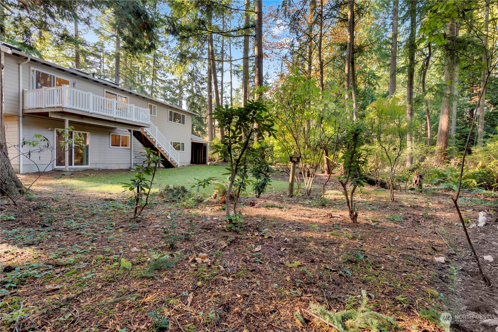 22215 49th Avenue Southeast Bothell, WA 98021 - Photo 33 of 35 a view of a house with a yard