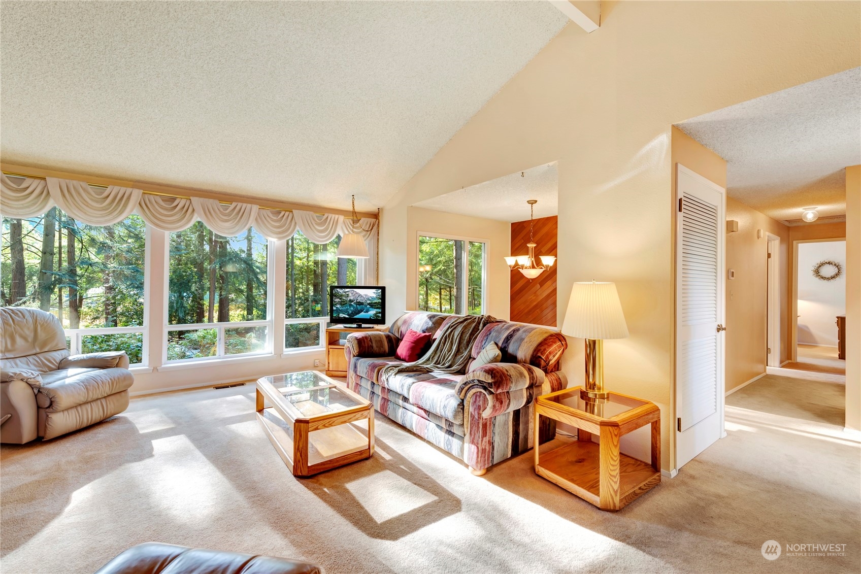 22215 49th Avenue Southeast Bothell, WA 98021 - Photo 7 of 35 a living room with furniture and a large window