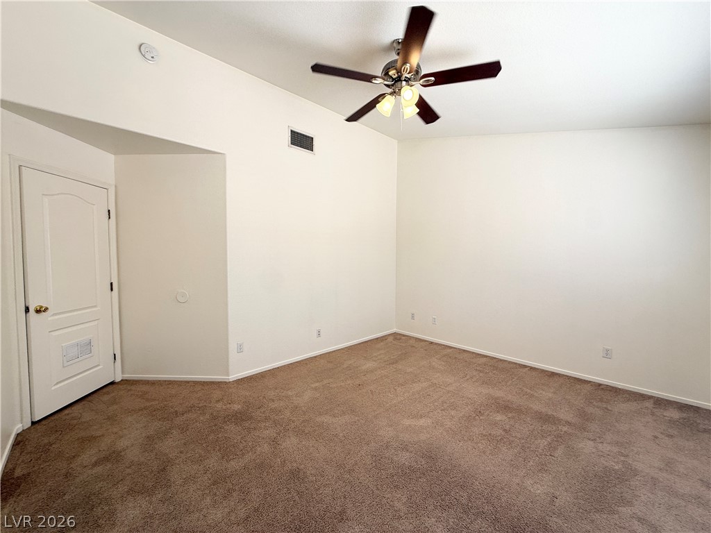 8870 Haviland Road Las Vegas, NV 89123 - Photo 16 of 24 A versatile room featuring neutral tones, perfect for personalizing to your taste.