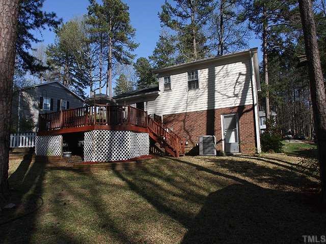 7933 Brandyapple Drive Raleigh, NC 27615 - Photo 12 of 12 Rear view of home and deck.