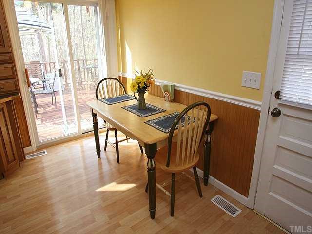 Bright, cheery breakfast nook with pation doors to oversized deck.