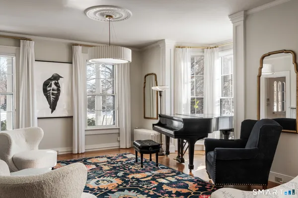 a living room with furniture and a window