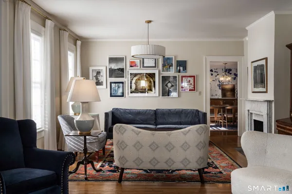 a living room with furniture and a window