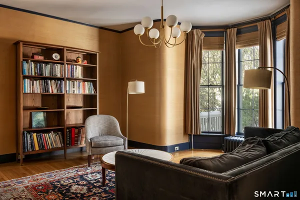 a living room with furniture and a window