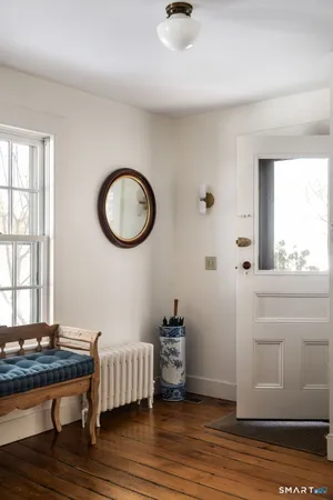 a view of livingroom with furniture and wooden floor