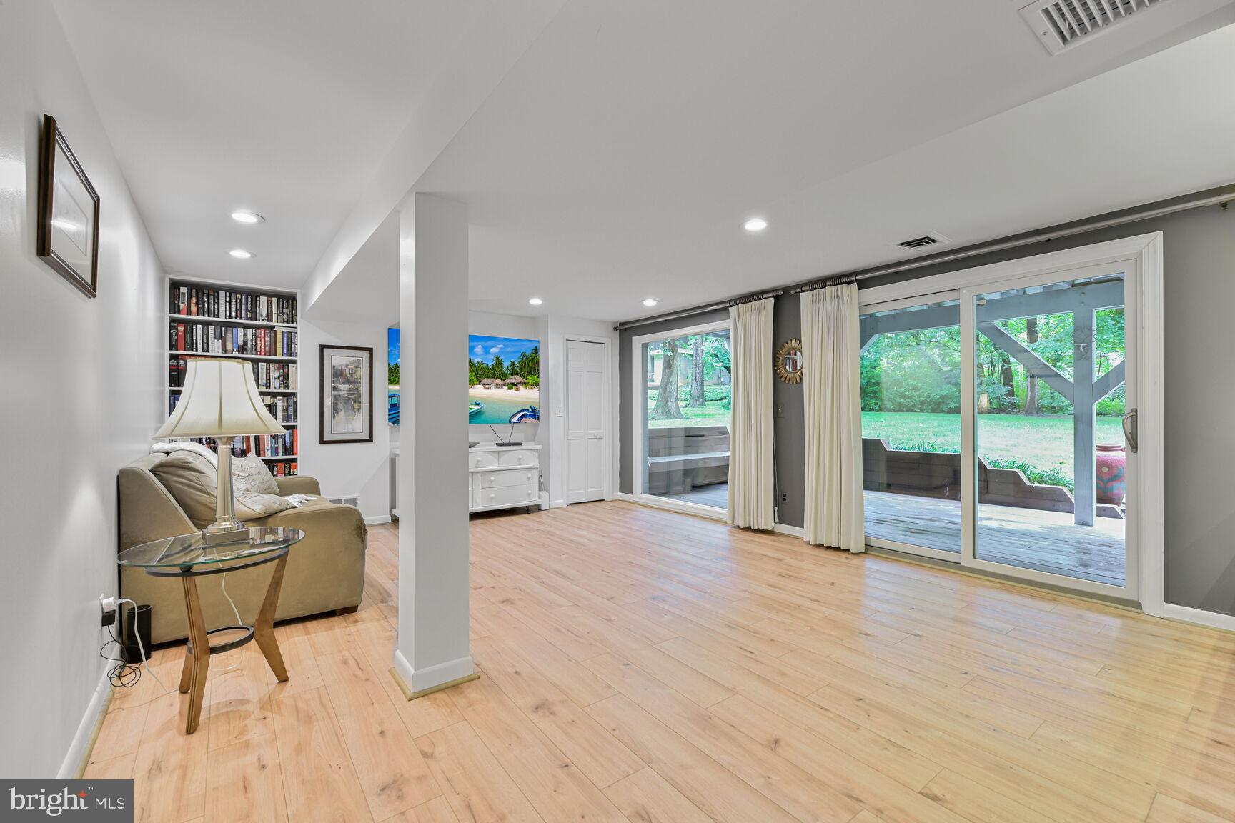 5 Persimmon Court Bethesda, MD 20817 - Photo 24 of 38 Family Room opens to Lower Level Deck