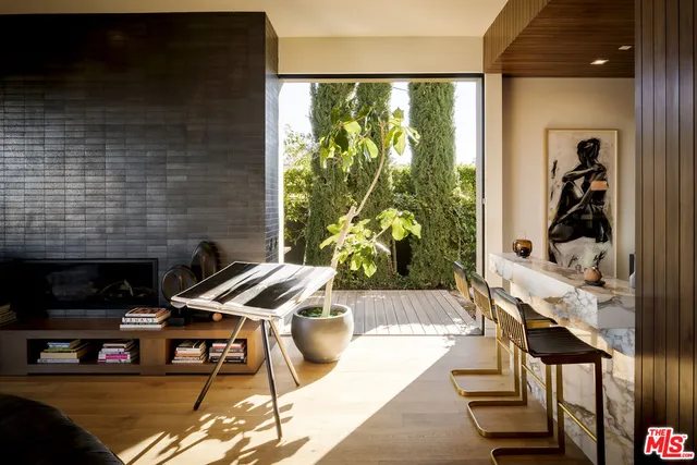 a view of a living room and dining room