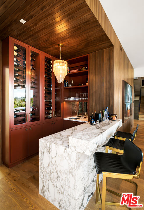 1030 Somera Road Los Angeles, CA 90077 - Photo 17 of 54 a view of a living room and kitchen