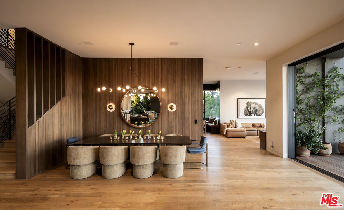 1030 Somera Road Los Angeles, CA 90077 - Photo 18 of 54 a view of a living room and dining room