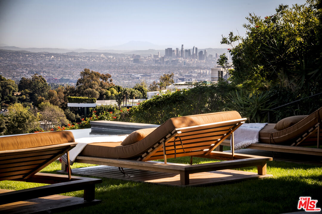 1030 Somera Road Los Angeles, CA 90077 - Photo 2 of 54 a view of a outdoor sitting area with furniture
