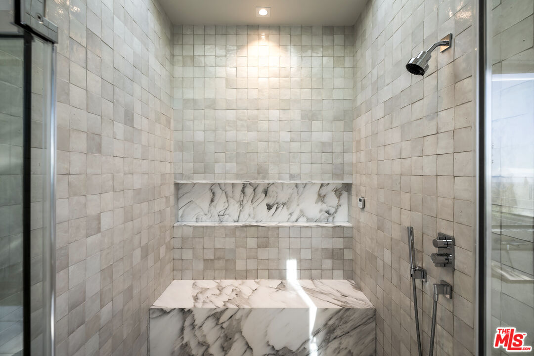 1030 Somera Road Los Angeles, CA 90077 - Photo 34 of 54 a room with a bed