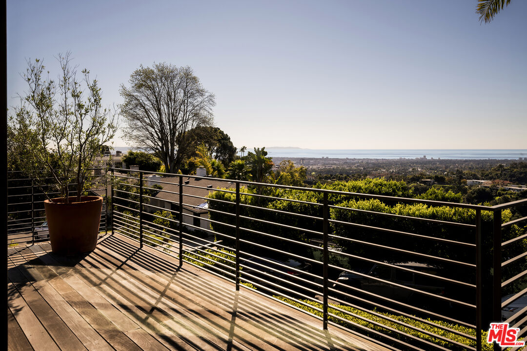 1030 Somera Road Los Angeles, CA 90077 - Photo 35 of 54 a view of outdoor space with lots of swings and slides