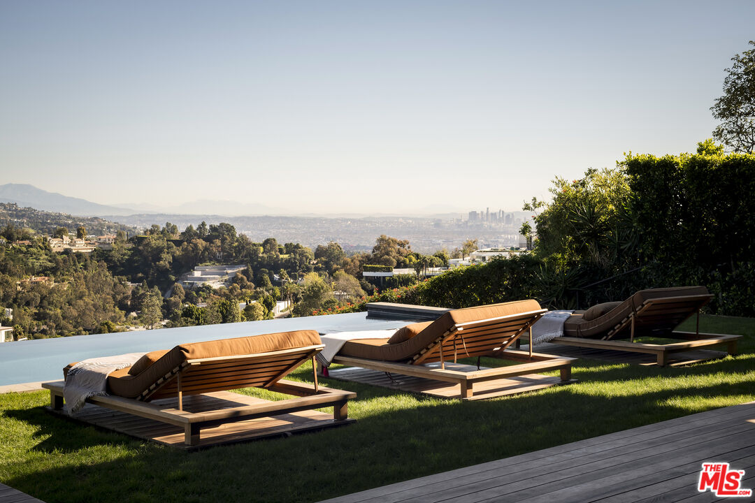1030 Somera Road Los Angeles, CA 90077 - Photo 46 of 54 an outdoor sitting area with furniture and city view