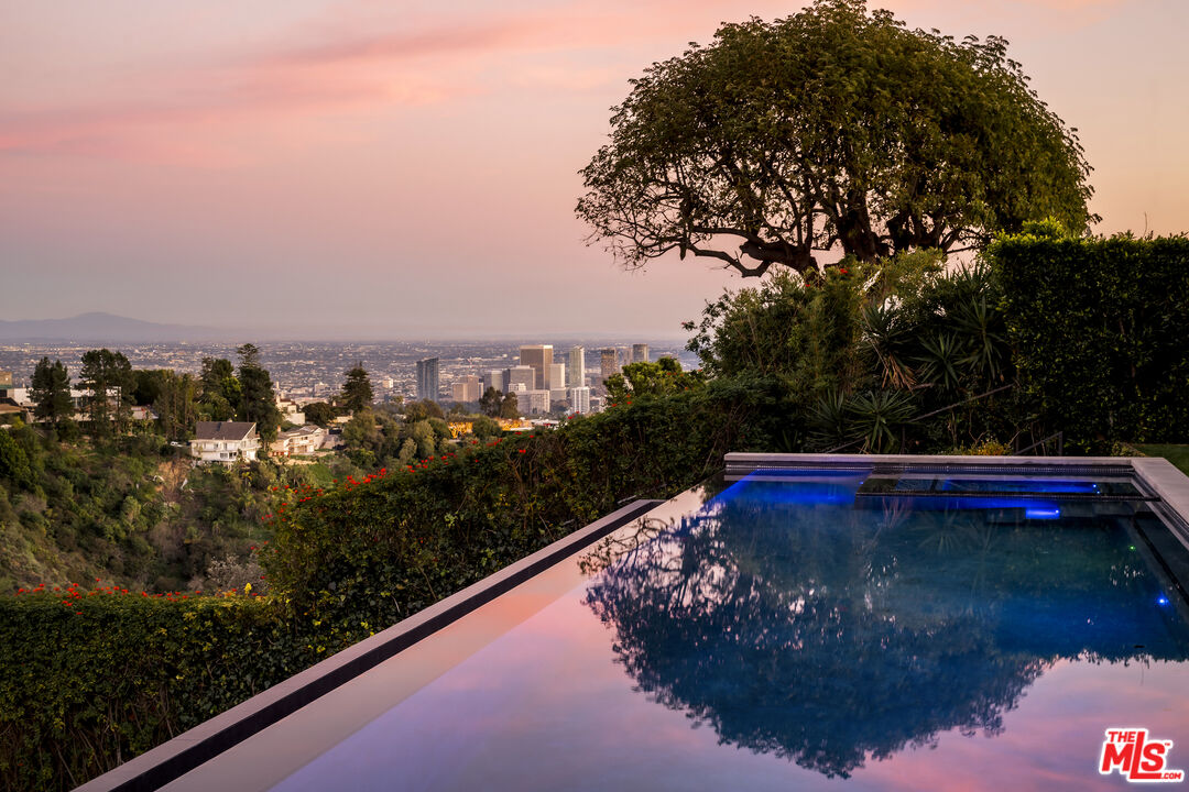 1030 Somera Road Los Angeles, CA 90077 - Photo 50 of 54 a view of swimming pool from a balcony