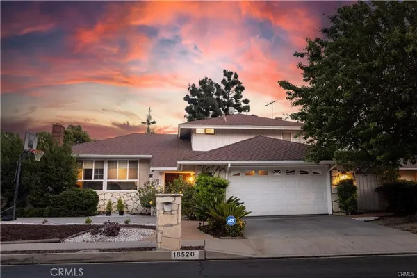front view of a house with a street