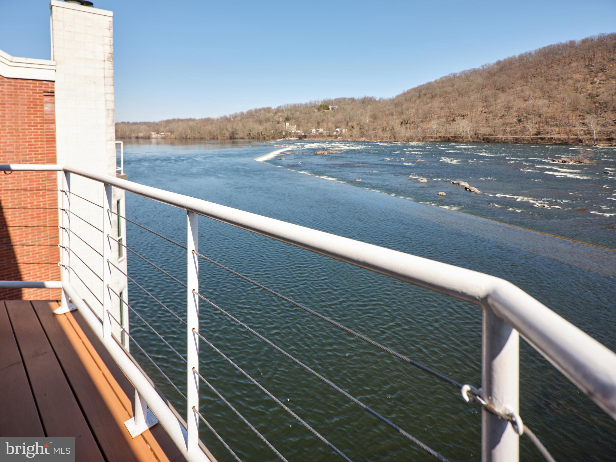 350 River Road, Unit D5 New Hope, PA 18938 - Photo 11 of 24 New Trex deck, stainless roping on primary balcony