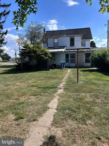 a house view with a garden space