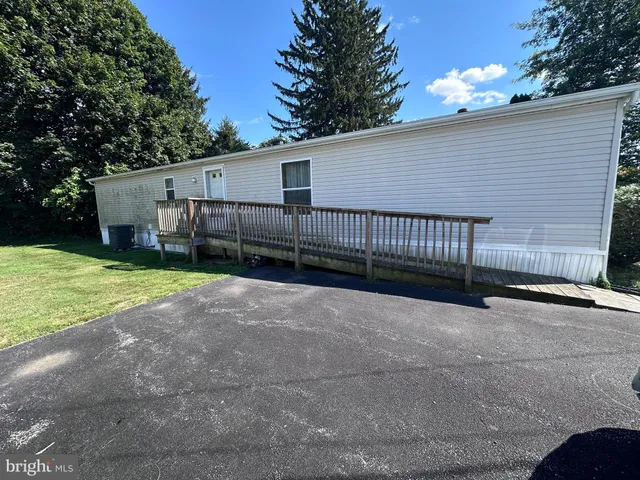 a view of a backyard with a garden