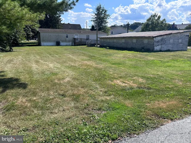 a view of outdoor space and yard
