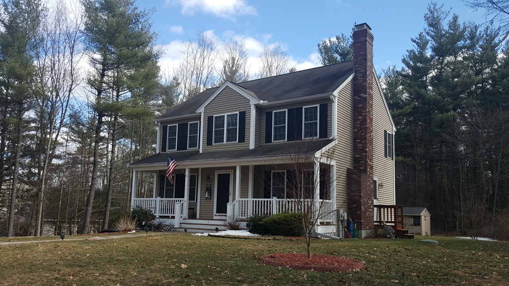 5 Hazen Road Shirley, MA 01464 - Photo 1 of 23 a front view of a house with a yard
