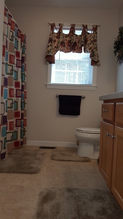 5 Hazen Road Shirley, MA 01464 - Photo 12 of 23 a bathroom with a sink and a mirror