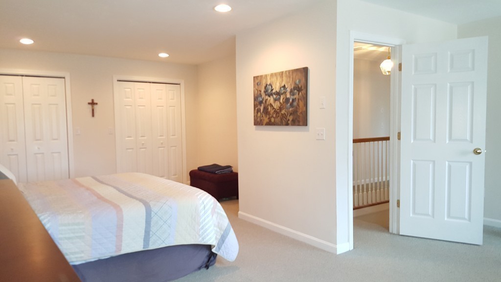 5 Hazen Road Shirley, MA 01464 - Photo 13 of 23 a bedroom with a bed and a walk in closet