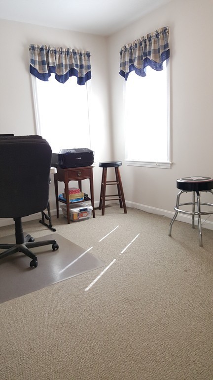 5 Hazen Road Shirley, MA 01464 - Photo 18 of 23 a room with gym equipment and a large window