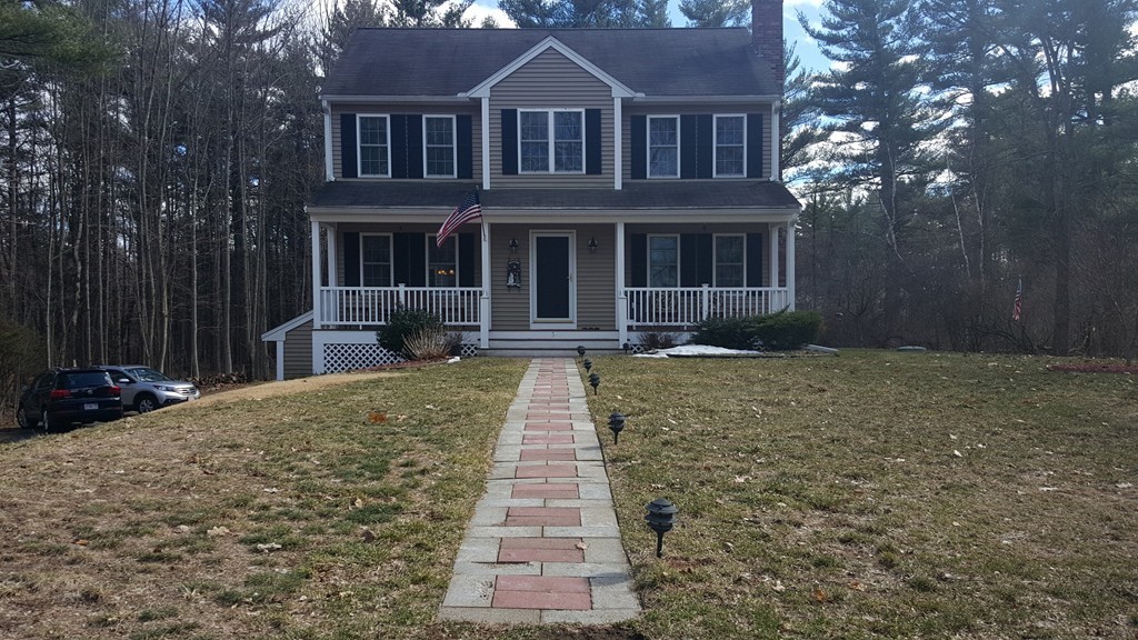 5 Hazen Road Shirley, MA 01464 - Photo 2 of 23 a front view of a house with yard and green space