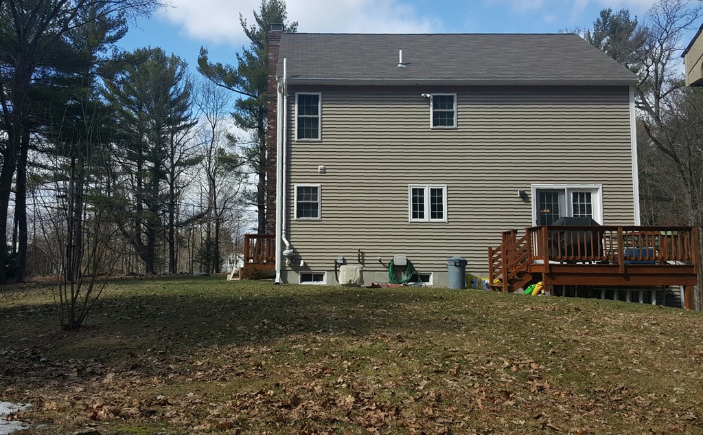 5 Hazen Road Shirley, MA 01464 - Photo 23 of 23 a front view of a house with a yard