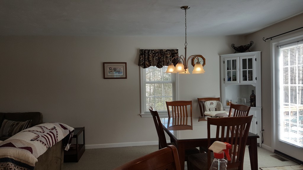 5 Hazen Road Shirley, MA 01464 - Photo 9 of 23 a view of a dining room with furniture window and wooden floor