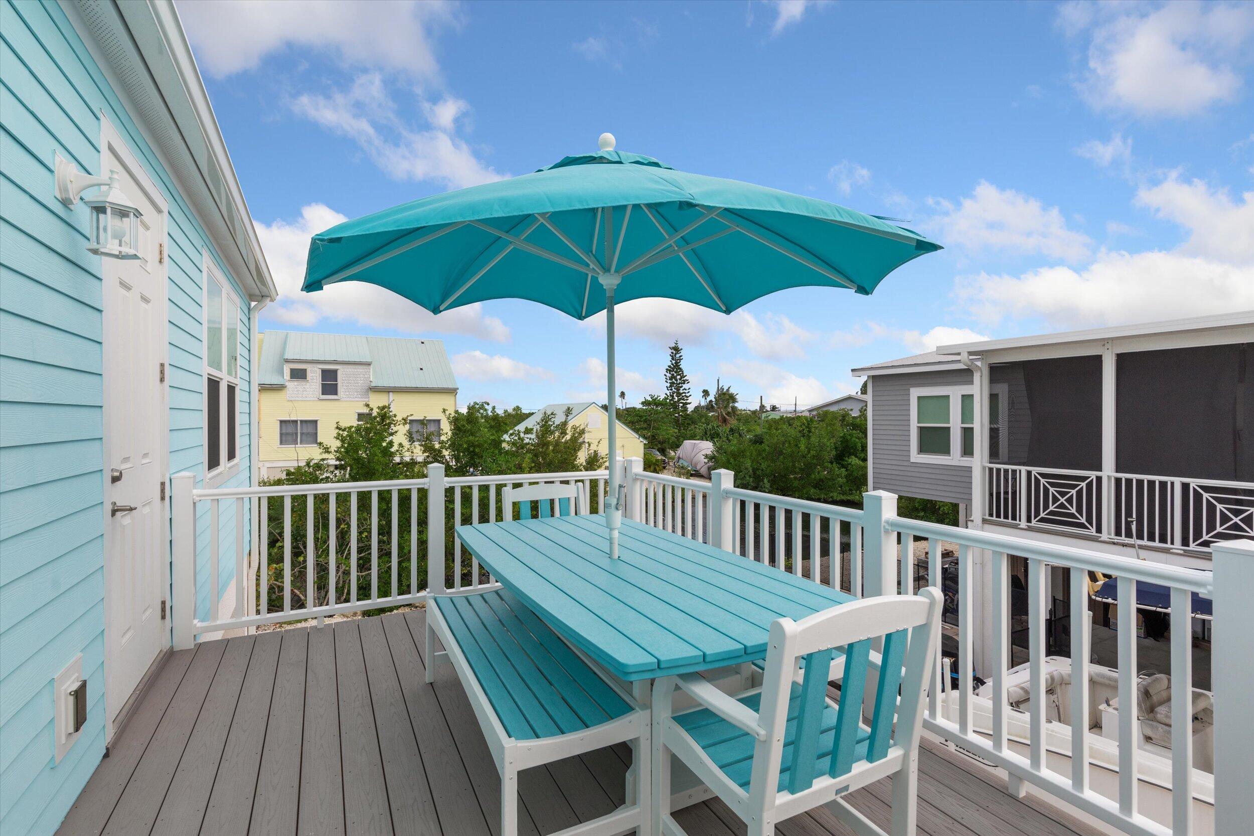 463 Les Rohde Drive Summerland Key, FL 33042 - Photo 5 of 29 a view of a roof deck with furniture