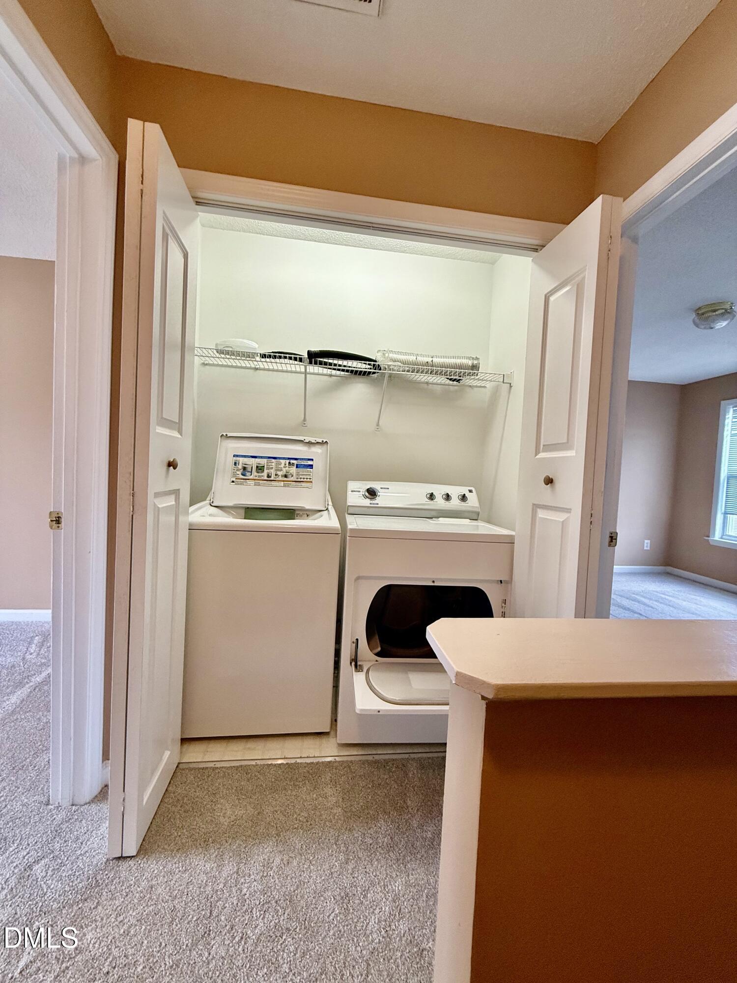 2341 Turtle Point Drive Raleigh, NC 27604 - Photo 14 of 28 Laundry Closet