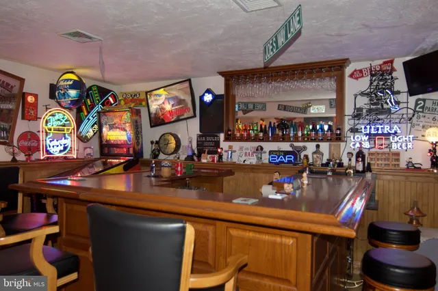 a room with lots of furniture and appliances