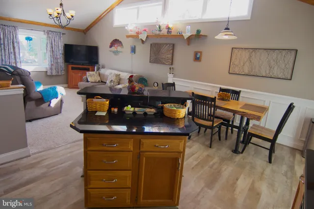 a living room with furniture and flat screen tv