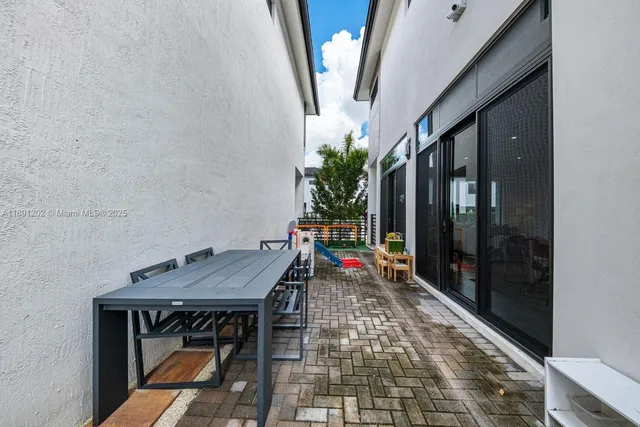 a white house with a outdoor space