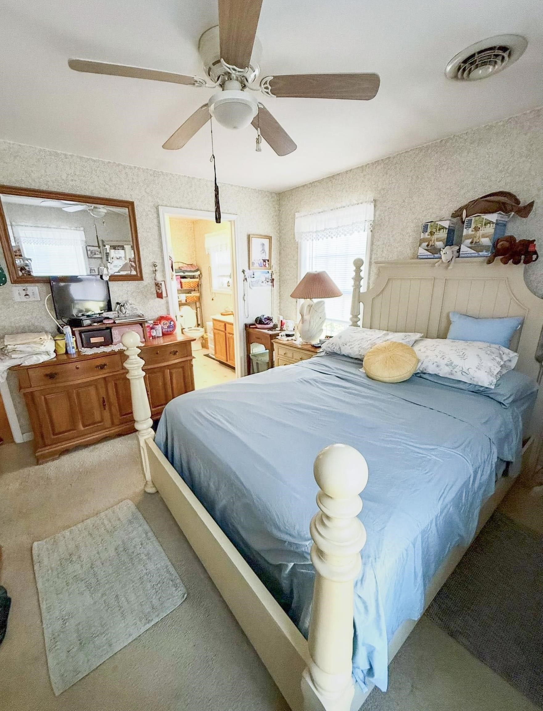 4 Rutledge Avenue Del Haven, NJ 08251 - Photo 15 of 21 a bed room with a bed and chandelier