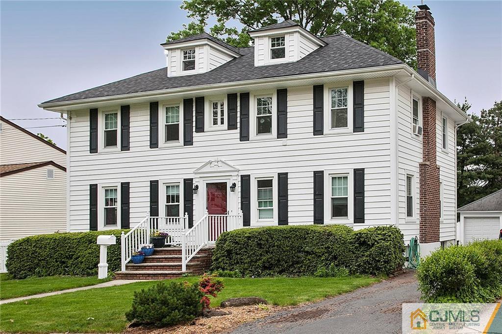 9 Lenox Street Edison, NJ 08817 - Photo 2 of 23 a front view of a house with a yard