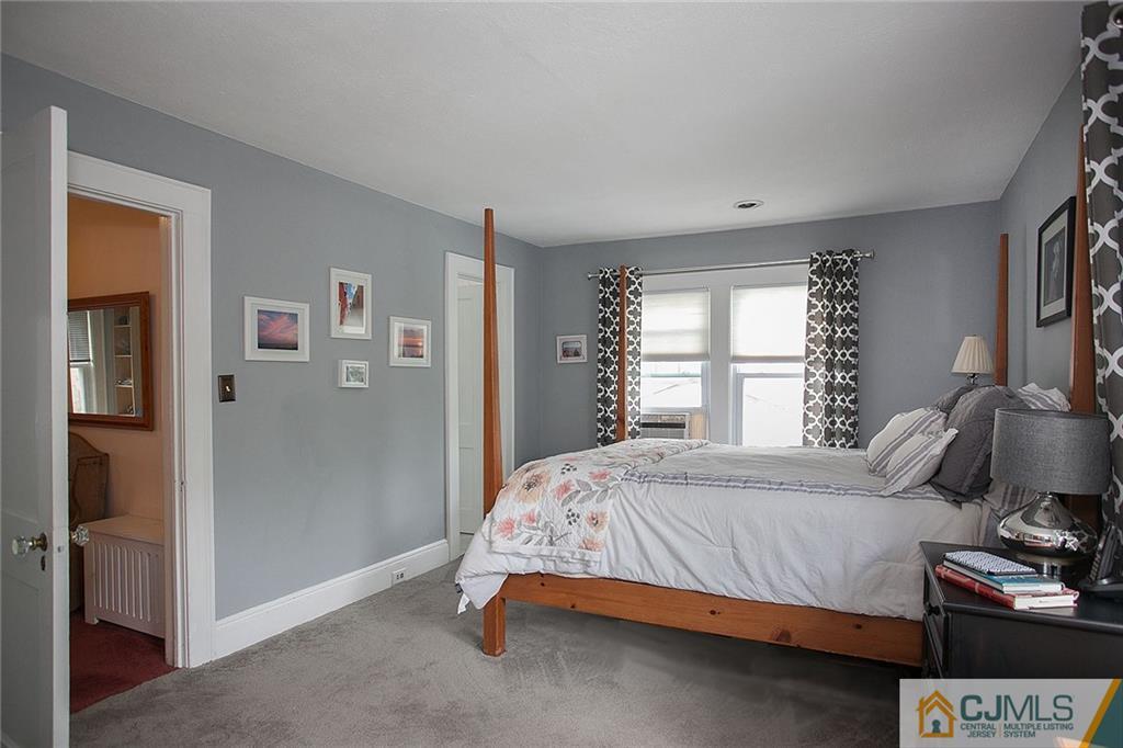 9 Lenox Street Edison, NJ 08817 - Photo 17 of 23 a bedroom with a bed and a window