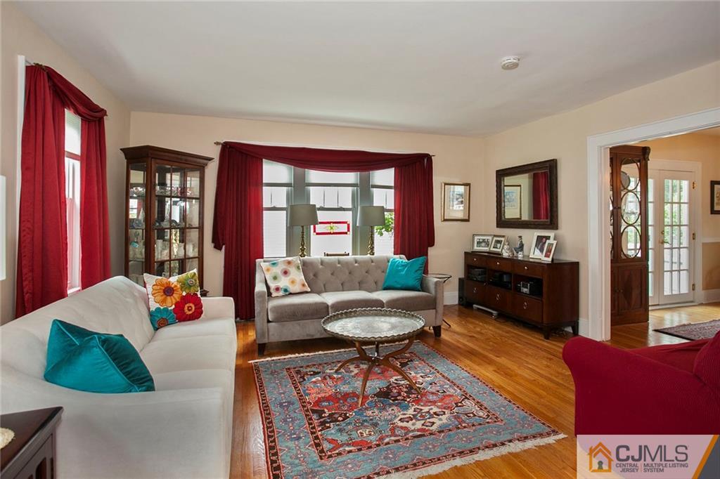 9 Lenox Street Edison, NJ 08817 - Photo 9 of 23 a living room with furniture and a rug
