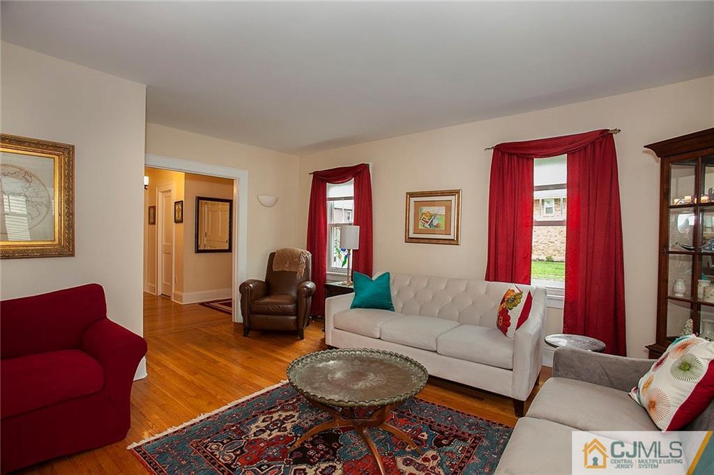 9 Lenox Street Edison, NJ 08817 - Photo 10 of 23 a living room with furniture a rug and a window