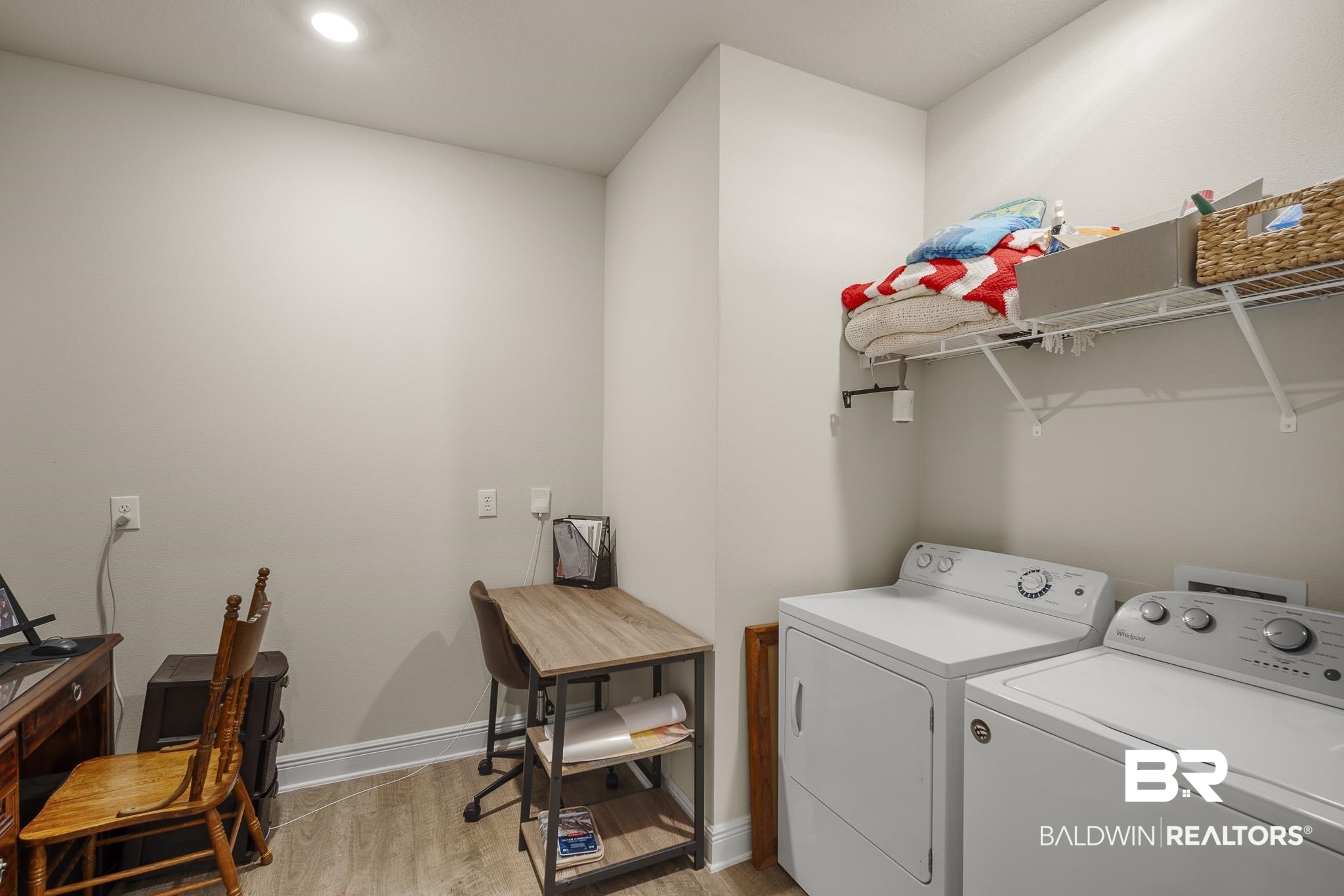 24765 Spectacular Bid Loop Daphne, AL 36526 - Photo 42 of 45 Washroom with washing machine and clothes dryer and light hardwood / wood-style floors