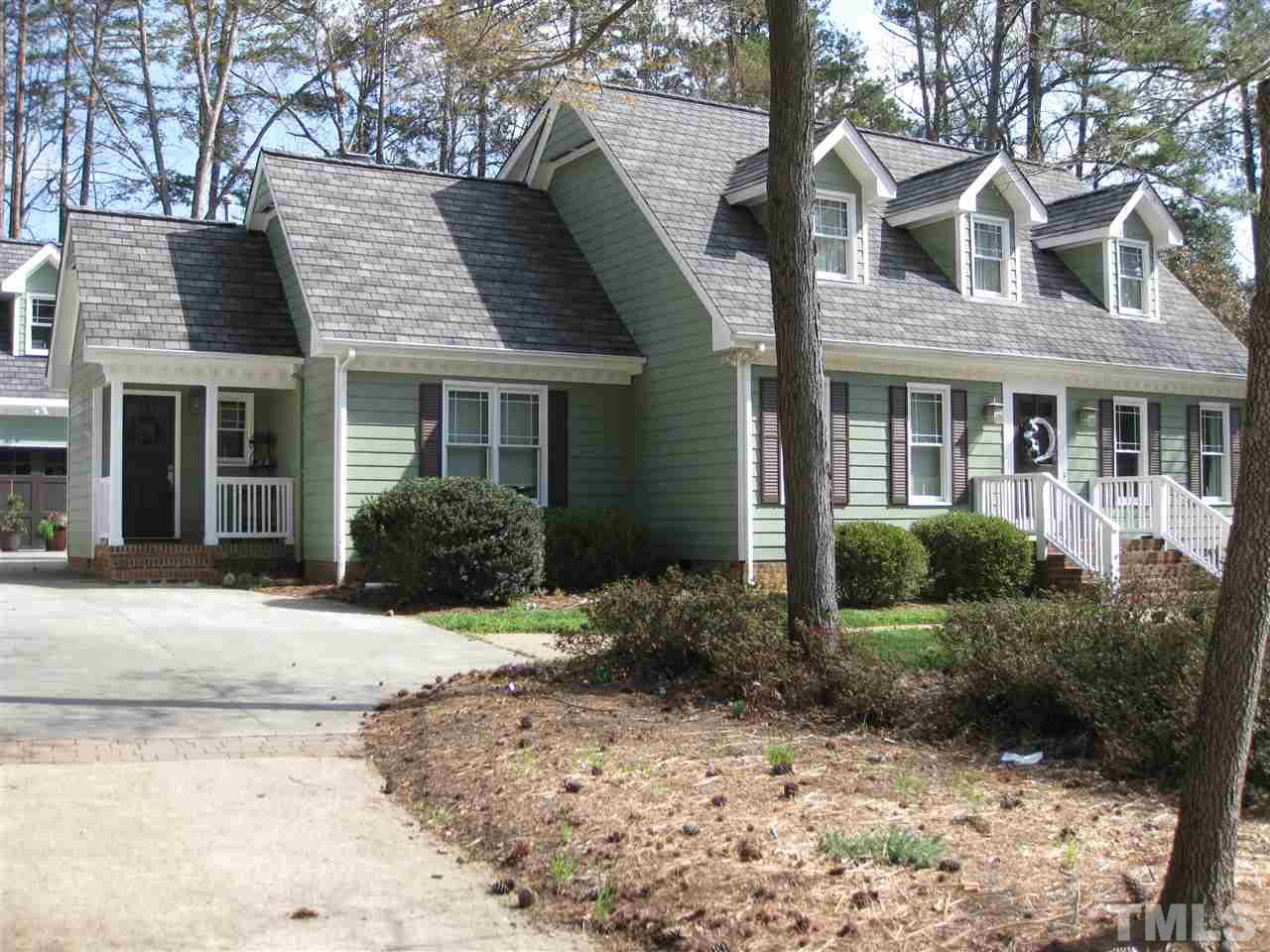 6523 Wynbrook Way Raleigh, NC 27612 - Photo 1 of 21 a view of a house with a yard and plants