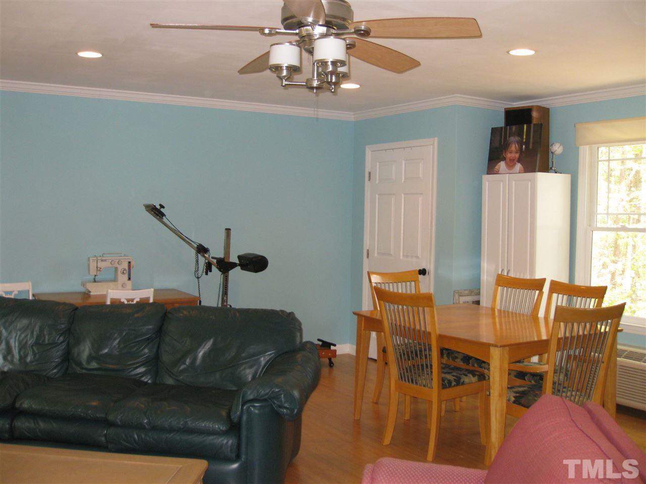 6523 Wynbrook Way Raleigh, NC 27612 - Photo 18 of 21 a living room with furniture