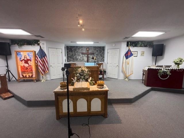 8826 Trevarthon Road Orlando, FL 32817 - Photo 13 of 57 a living room with furniture and a flat screen tv