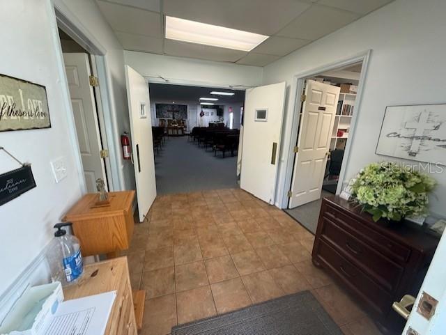 8826 Trevarthon Road Orlando, FL 32817 - Photo 20 of 57 a living room with furniture and a large window