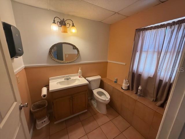 8826 Trevarthon Road Orlando, FL 32817 - Photo 29 of 57 a utility room with dryer and washer